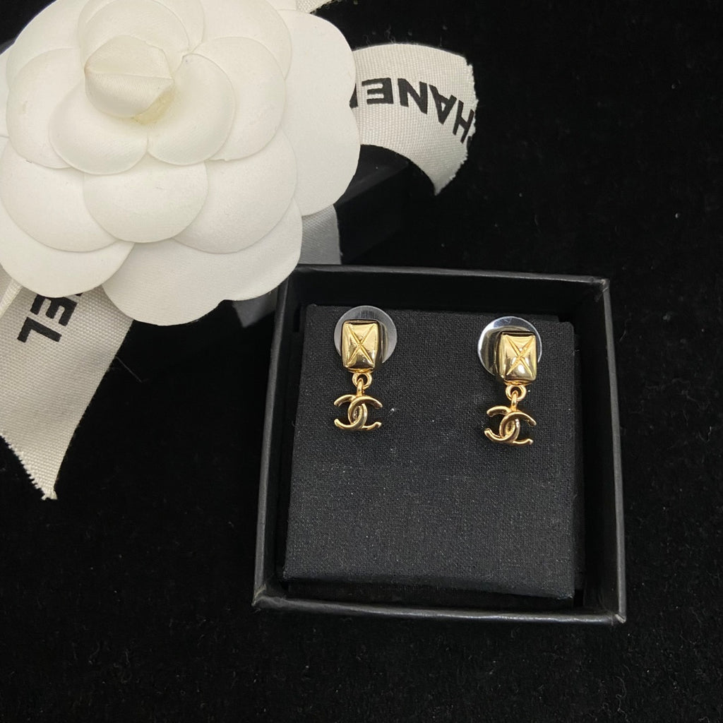 Double-C Emblem Stud Earrings in Polished Metal-Tone – Design 203 detail view
