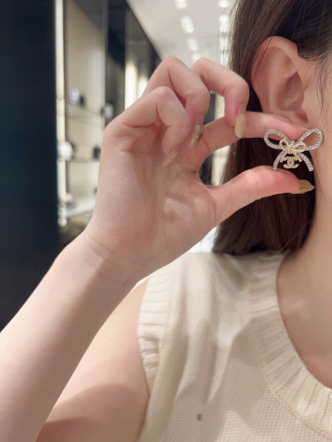 Double-C Emblem Stud Earrings in Polished Metal-Tone – Design 184 detail view