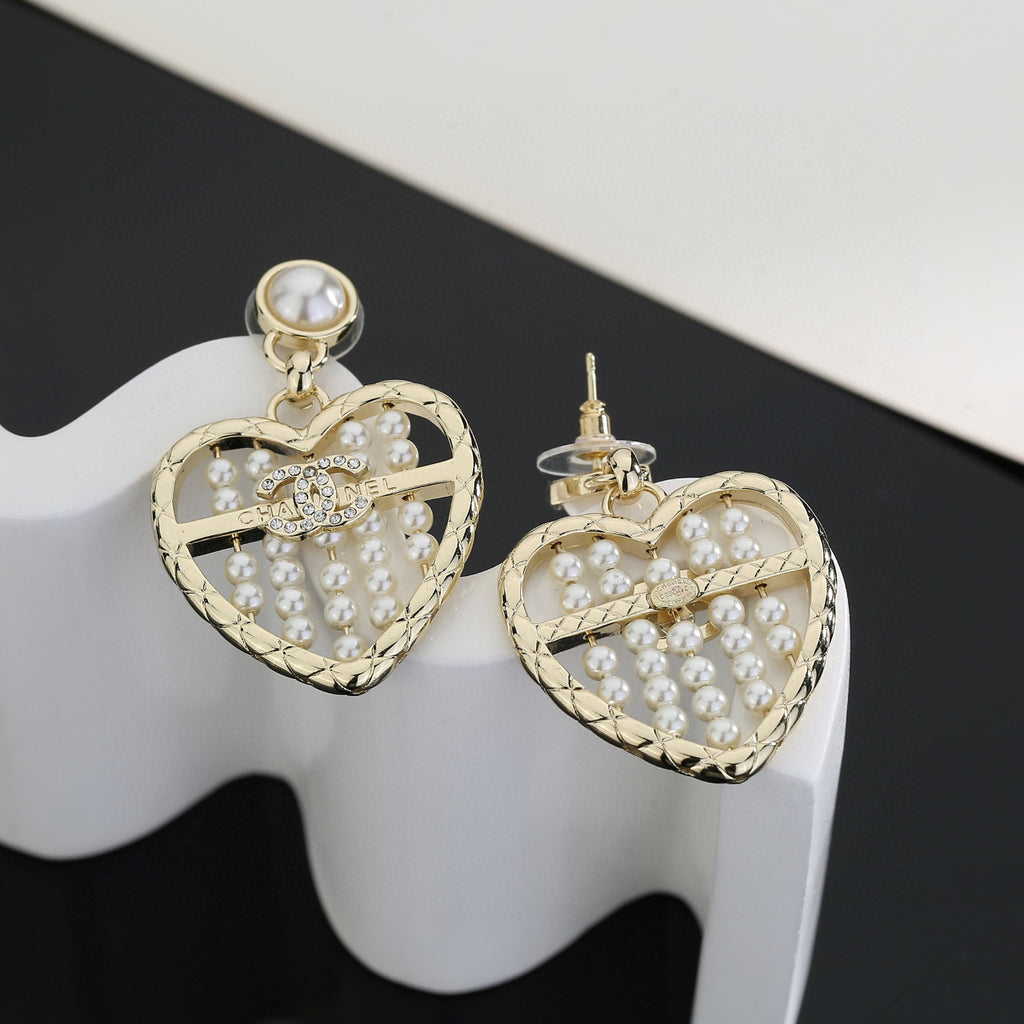 Signature Emblem Stud Earrings in Gold-Tone – Design 025 close-up detail