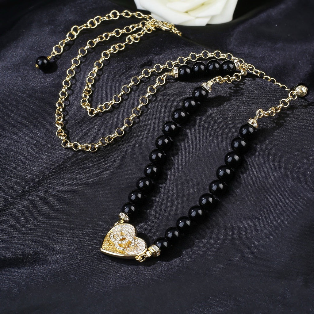 Heart Jewelry Accessory in Polished Metal-Tone – Heart Detail styled product view