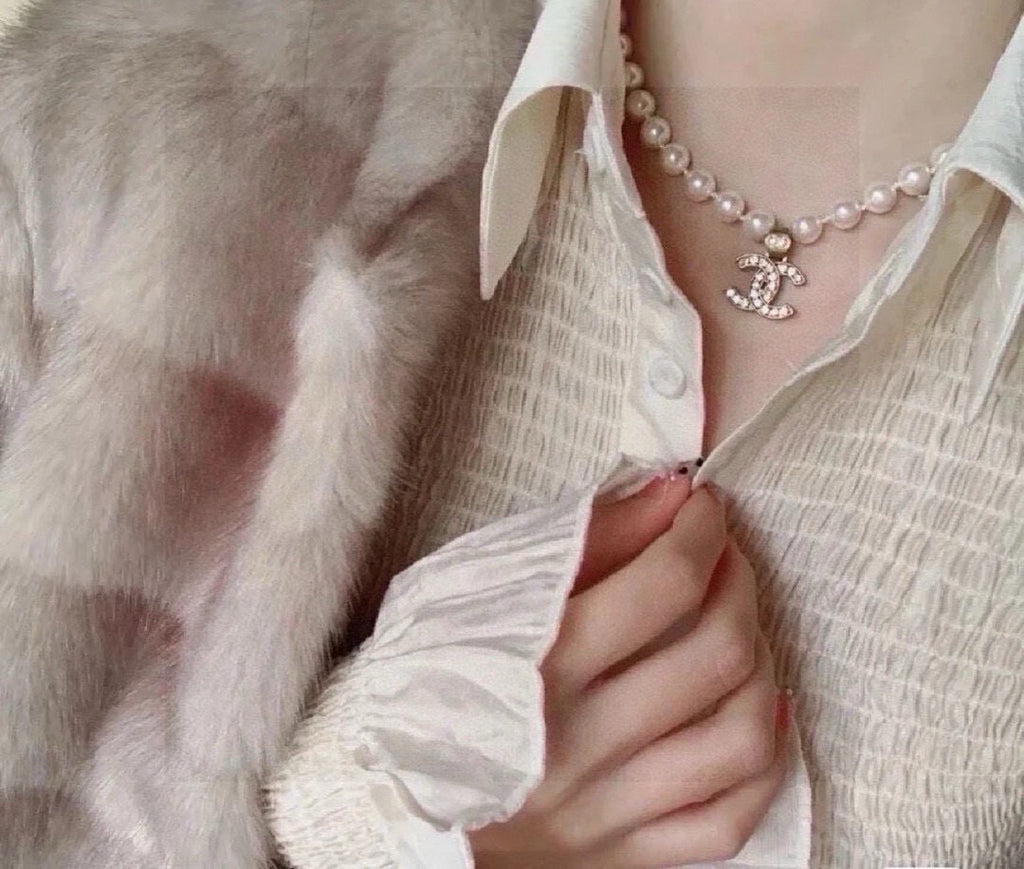 Double-C Emblem Pearl-Detail Pendant Necklace – Pearl Detail – Design 047 styled product view