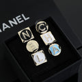 Letter Stud Earrings in Polished Metal-Tone – Design 009 main product view