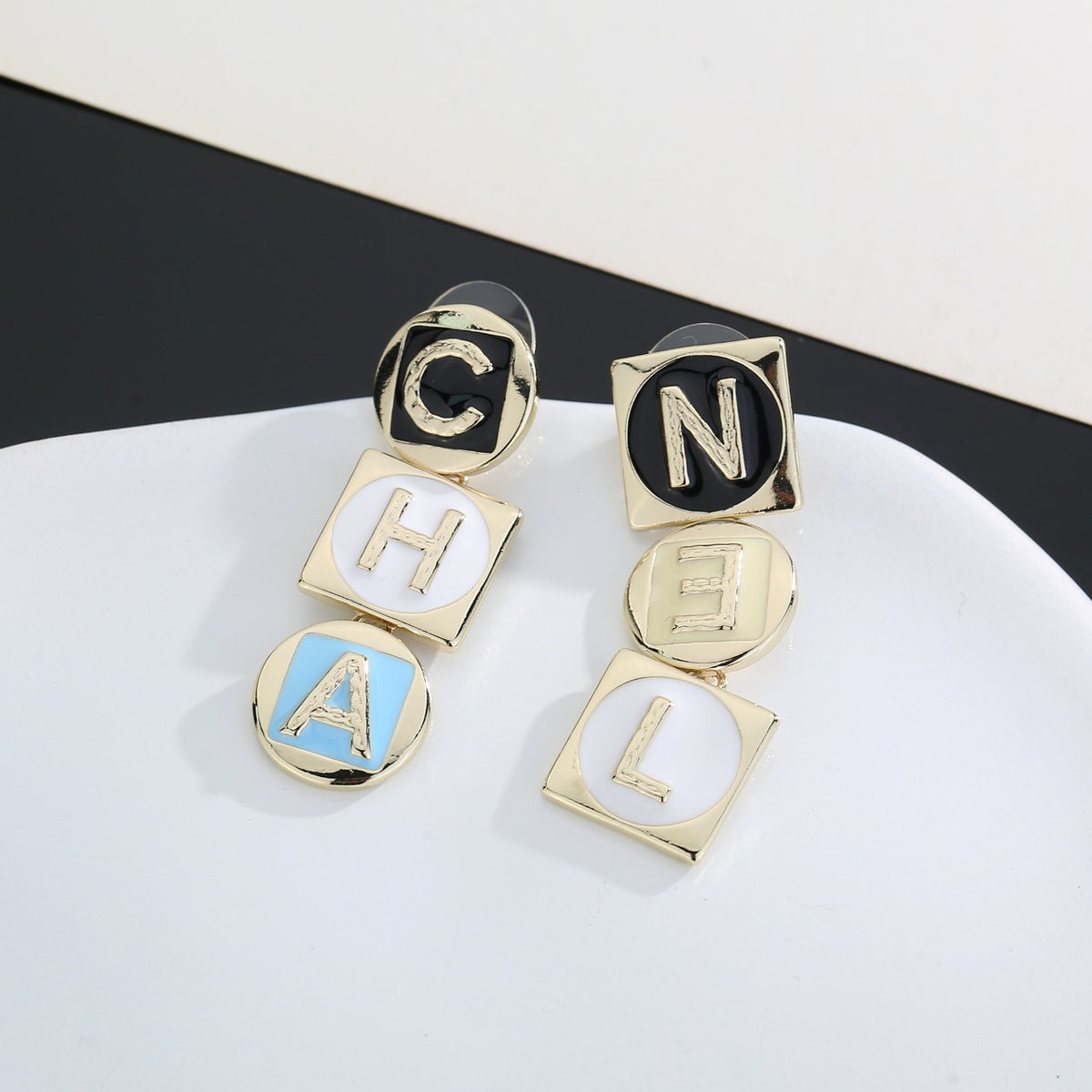 Letter Stud Earrings in Polished Metal-Tone – Design 009 front product view