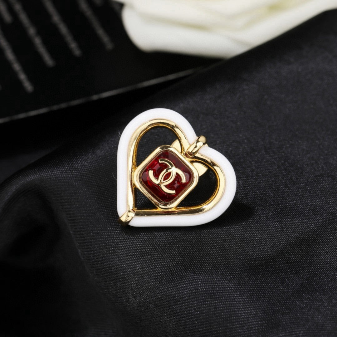 Double-C Emblem Brooch in Polished Metal-Tone – Design 028 detail view