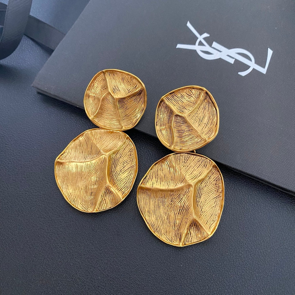 Saint Laurent Round Statement Earrings in Polished Metal-Tone close-up detail