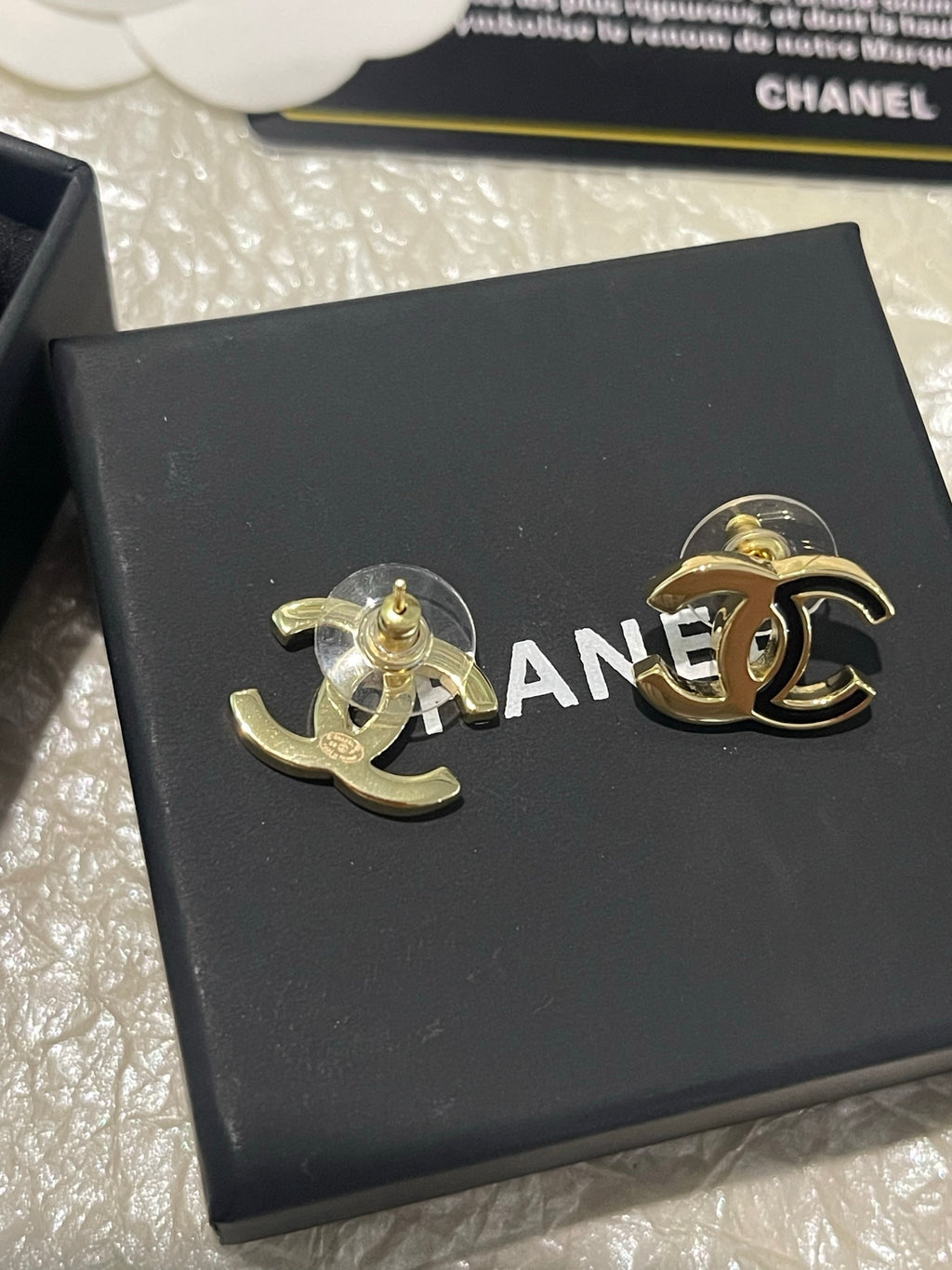 Double-C Emblem Stud Earrings in Polished Metal-Tone – Black Detail – Design 003 styled product view