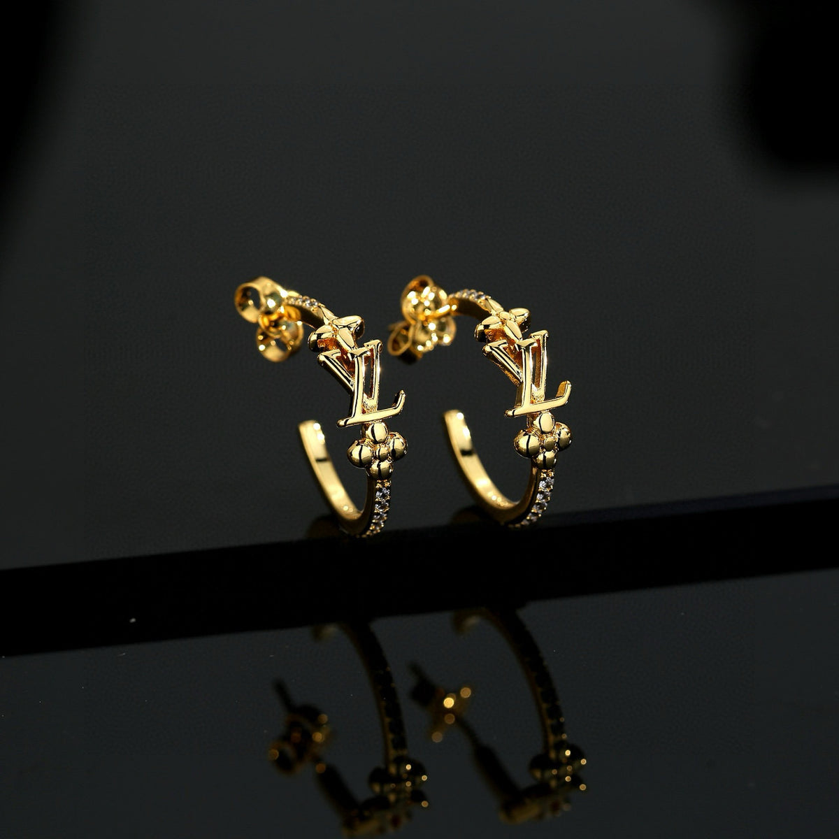 Letter Emblem Stud Earrings in Polished Metal-Tone – Design 017 close-up detail
