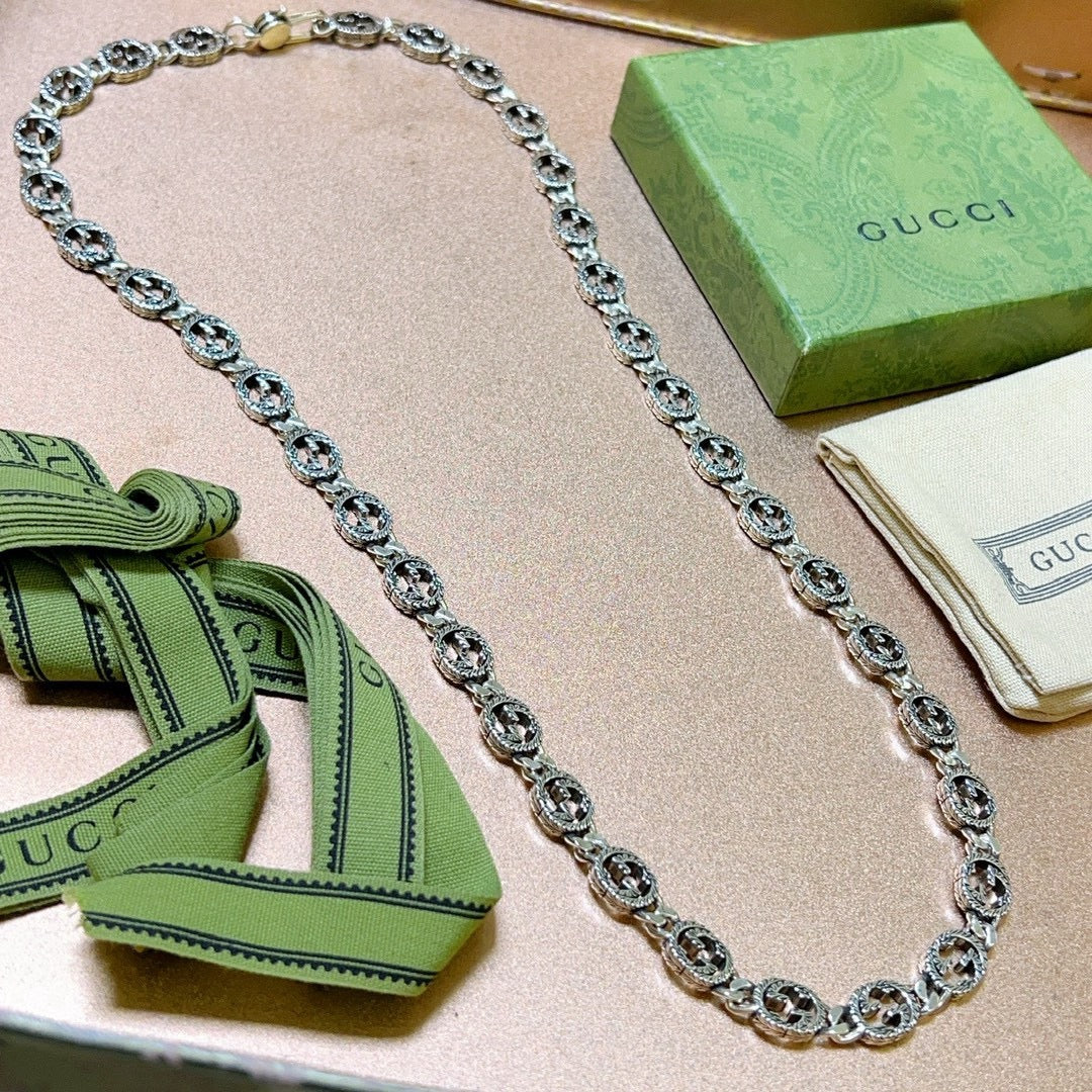 Double-G Emblem Pendant Necklace in Polished Metal-Tone – Vintage Detail – Design 029 detail view