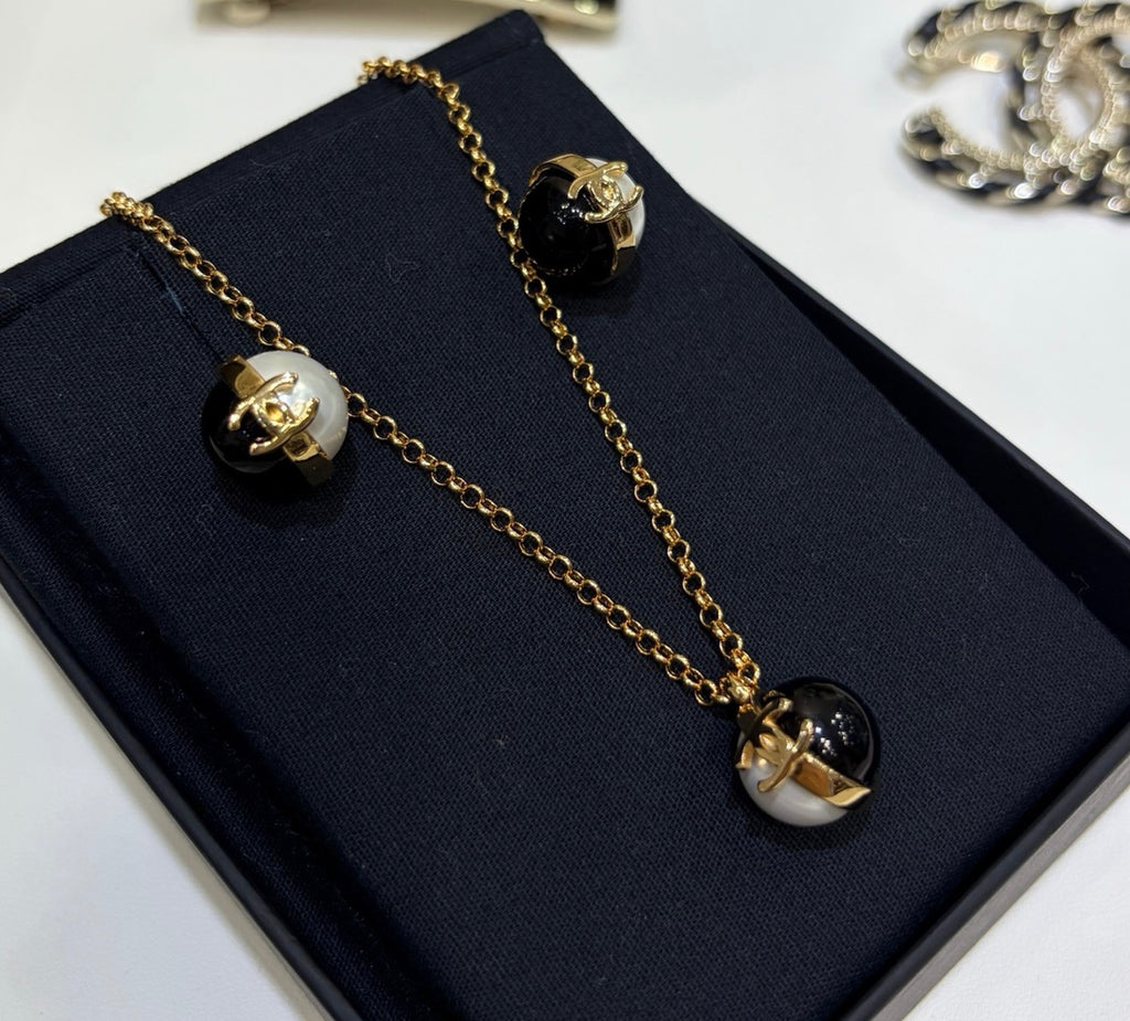 Double-C Emblem Pearl-Detail Pendant Necklace – Pearl Detail – Design 064 side detail