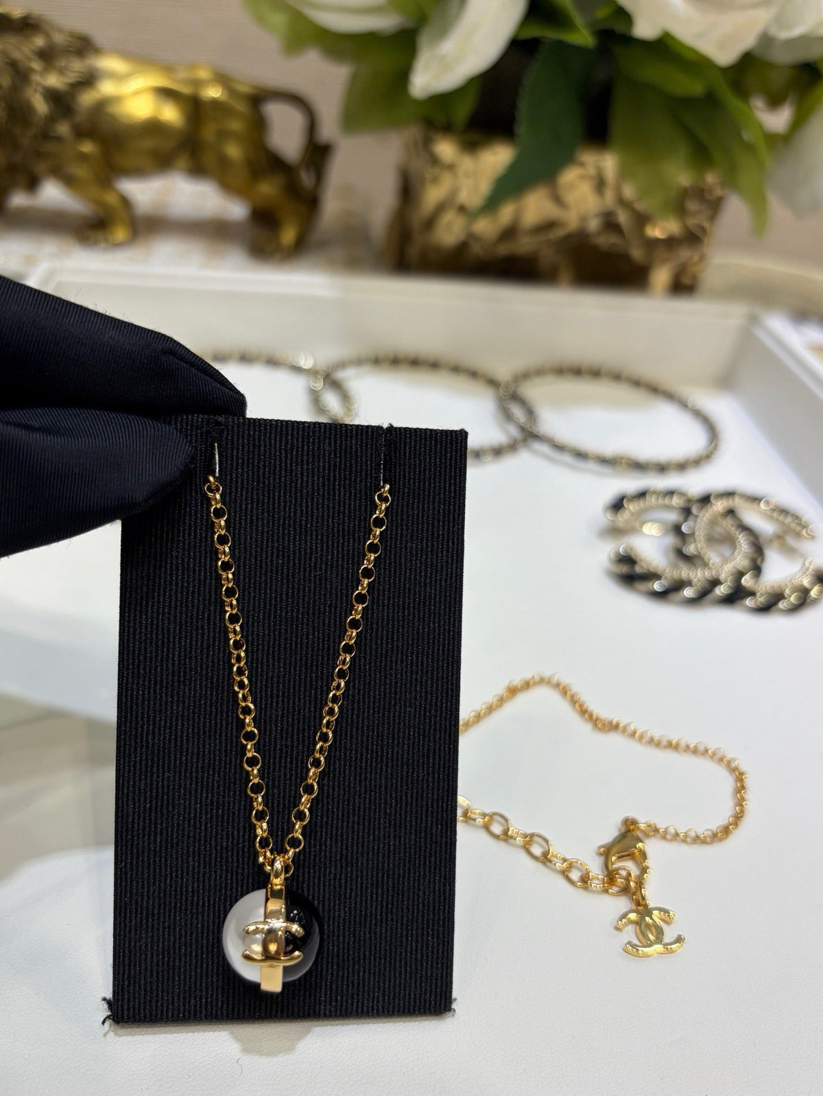Double-C Emblem Pearl-Detail Pendant Necklace – Pearl Detail – Design 064 styled product view