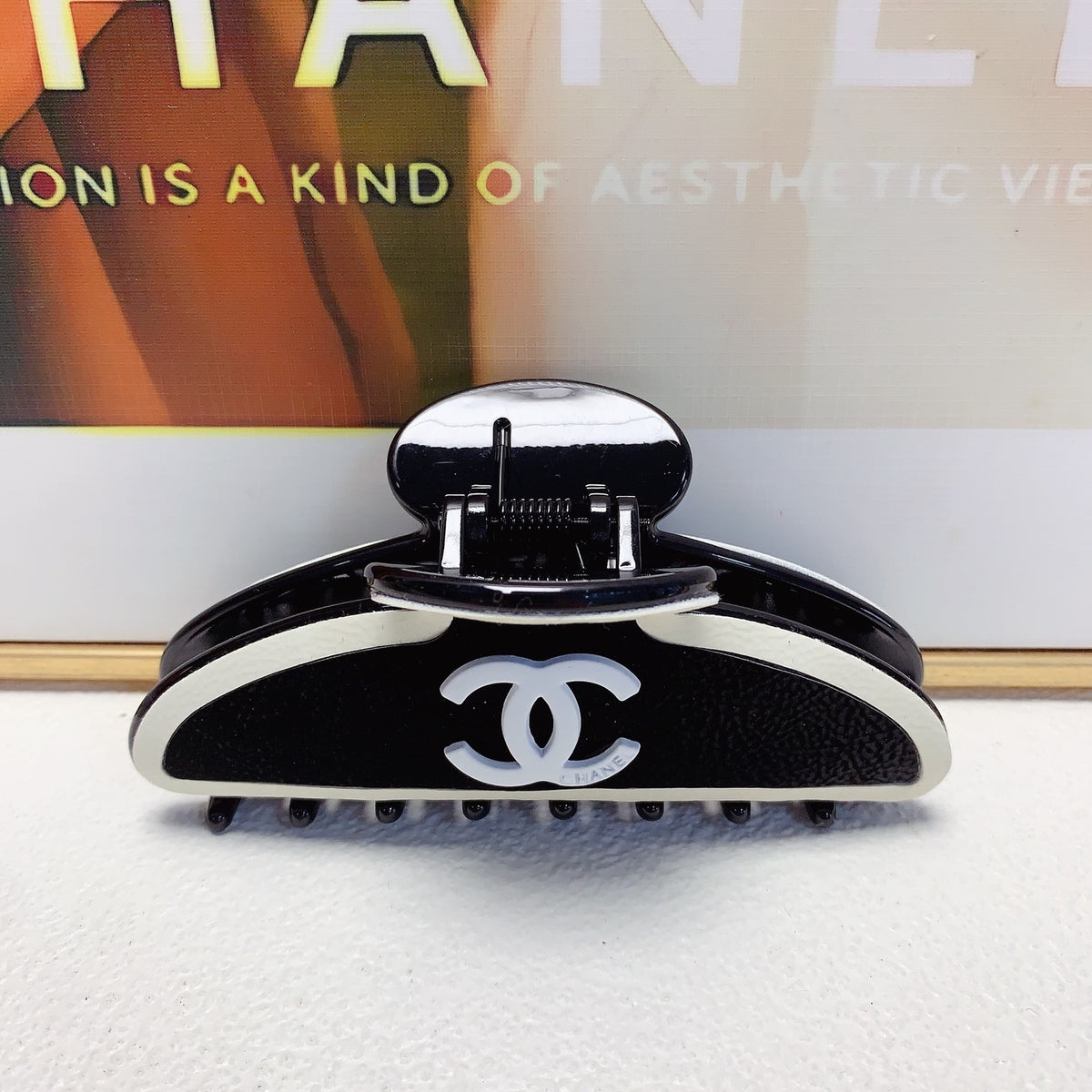 Signature Emblem Hair Clip – Black Detail detail view