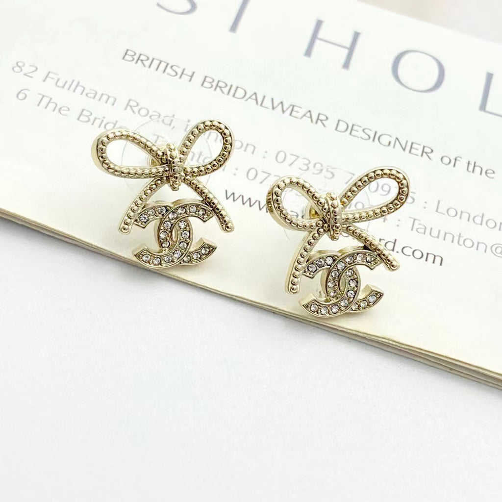 Double-C Emblem Stud Earrings in Polished Metal-Tone – Design 283 main product view