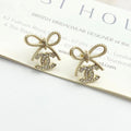 Double-C Emblem Stud Earrings in Polished Metal-Tone – Design 283 main product view