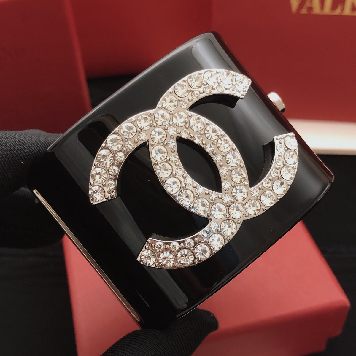 Signature Emblem Bangle in Silver-Tone – Black Detail main product view