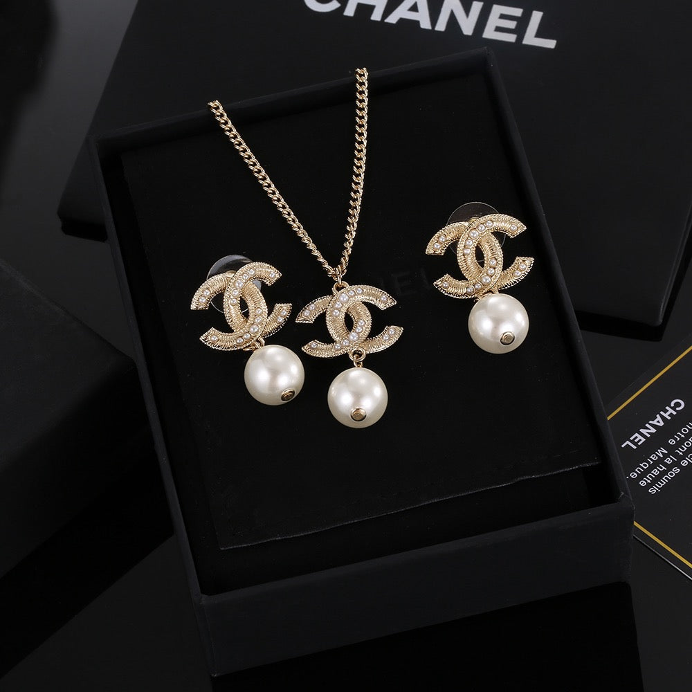 Double-C Emblem Pearl-Detail Pendant Necklace – Pearl Detail – Design 056 styled product view