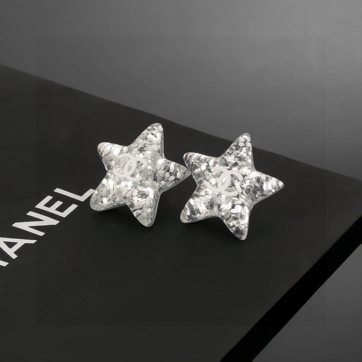 Double-C Emblem Stud Earrings in Silver-Tone – Star Detail – Design 003 main product view