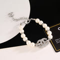 Double-C Emblem Bracelet in Gold-Tone – Pearl Detail – Design 004 main product view