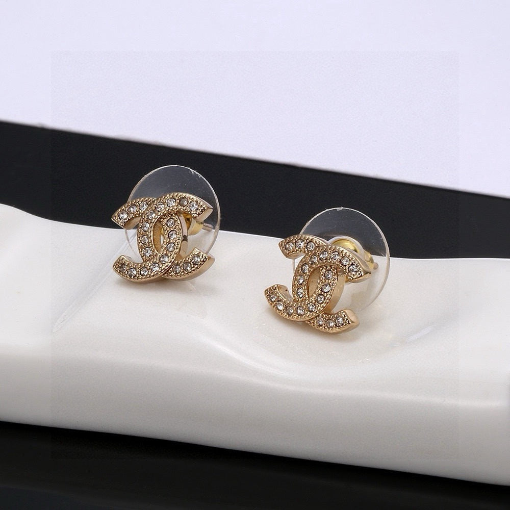 Double-C Emblem Stud Earrings in Silver-Tone – Design 004 detail view