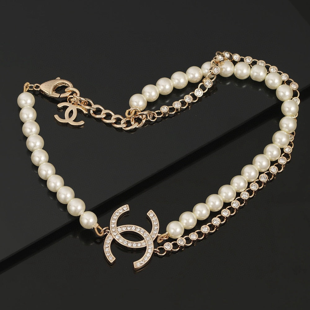 Double-C Emblem Pearl-Detail Pendant Necklace – Pearl Detail – Design 055 close-up detail