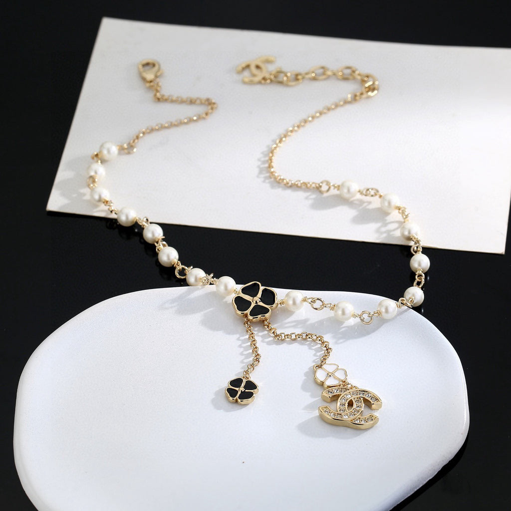 Double-C Emblem Pearl-Detail Pendant Necklace – Pearl Detail – Design 082 close-up detail