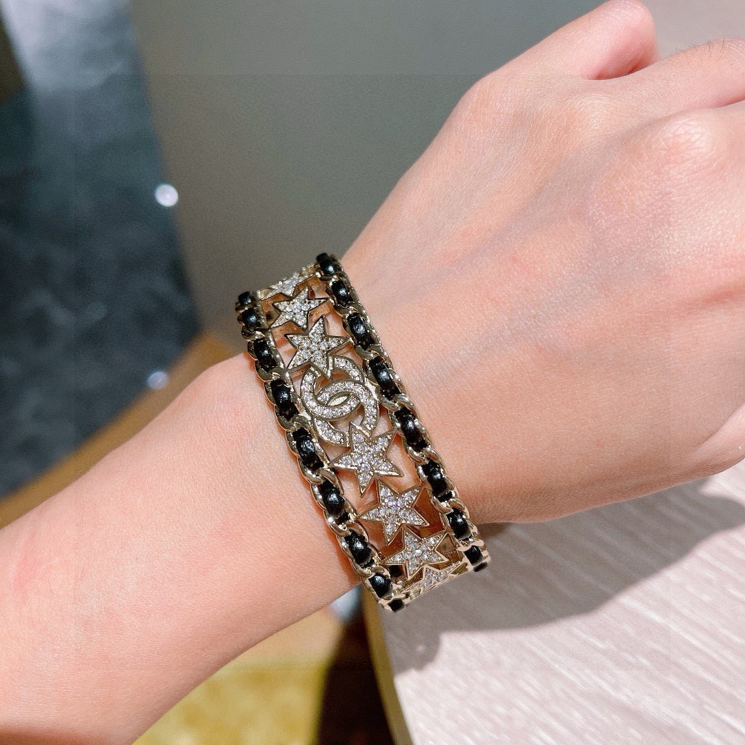 Signature Emblem Bangle in Polished Metal-Tone – Black Detail – Design 007 detail view
