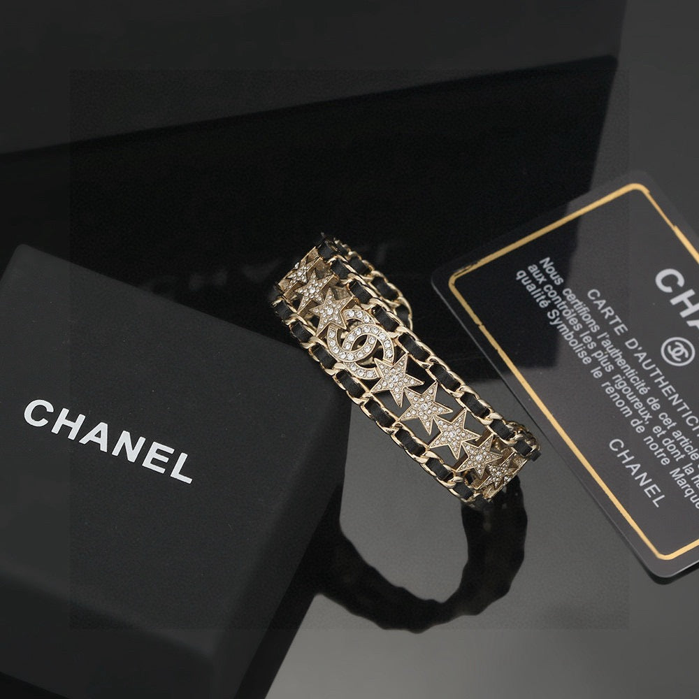 Signature Emblem Bangle in Polished Metal-Tone – Black Detail – Design 007 side detail