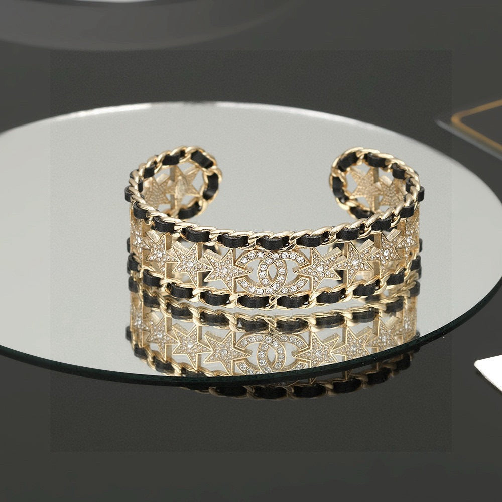 Signature Emblem Bangle in Polished Metal-Tone – Black Detail – Design 007 styled product view