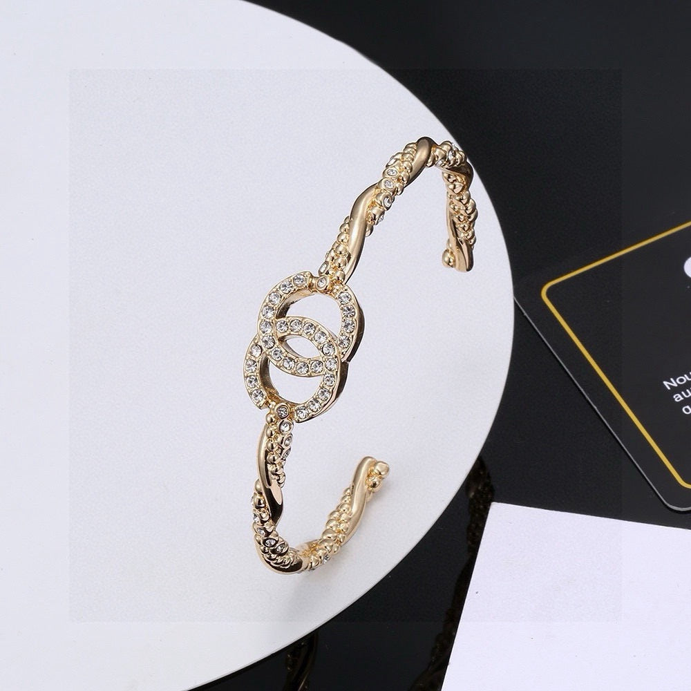 Signature Emblem Bangle in Polished Metal-Tone – Design 028 styled product view