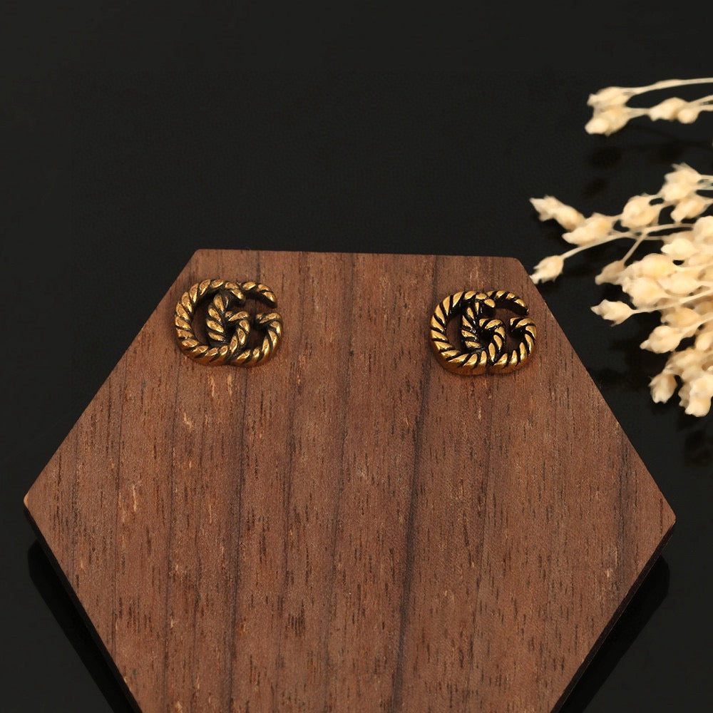 Geometric Emblem Stud Earrings in Polished Metal-Tone – Design 033 close-up detail