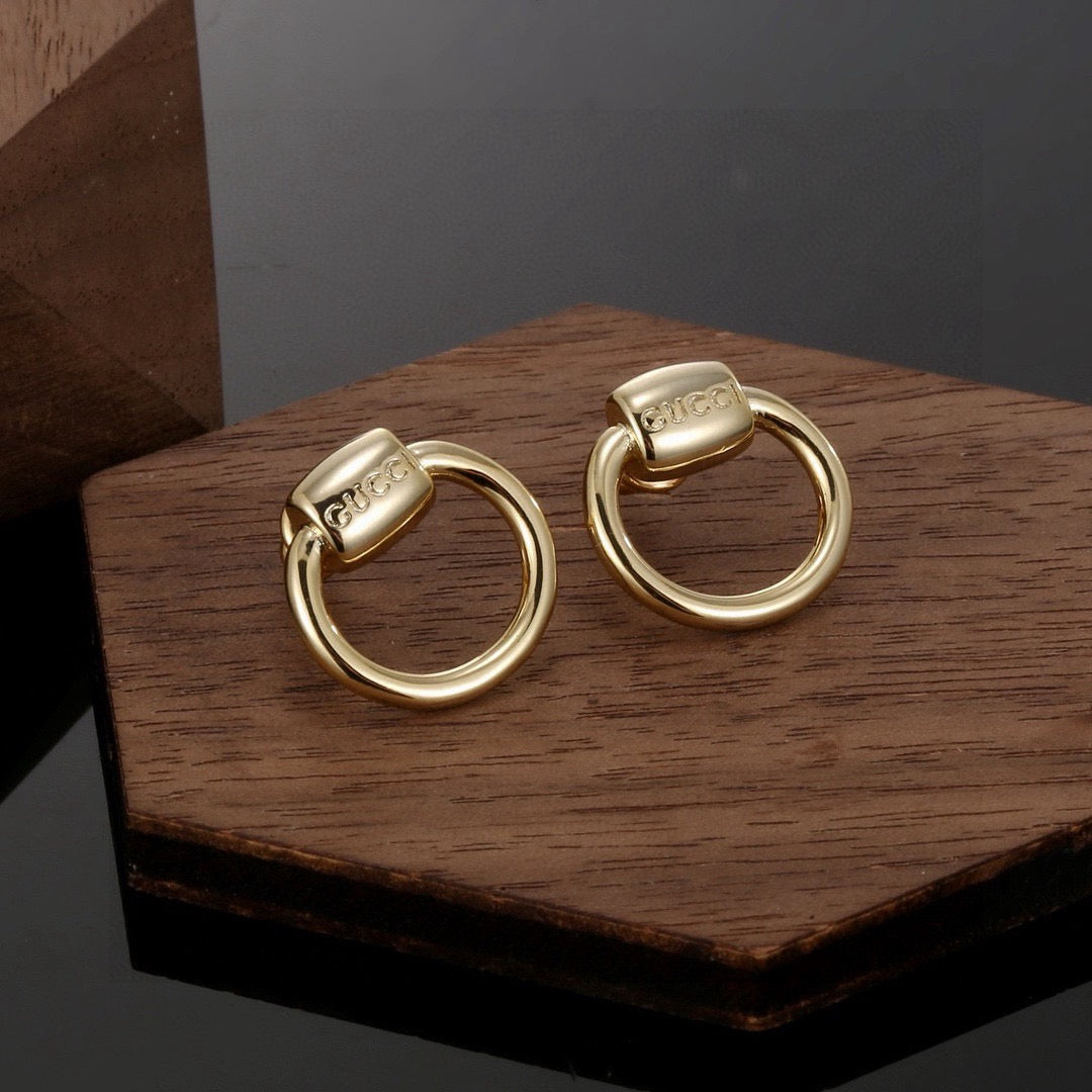 Geometric Emblem Stud Earrings in Polished Metal-Tone – Design 041 front product view