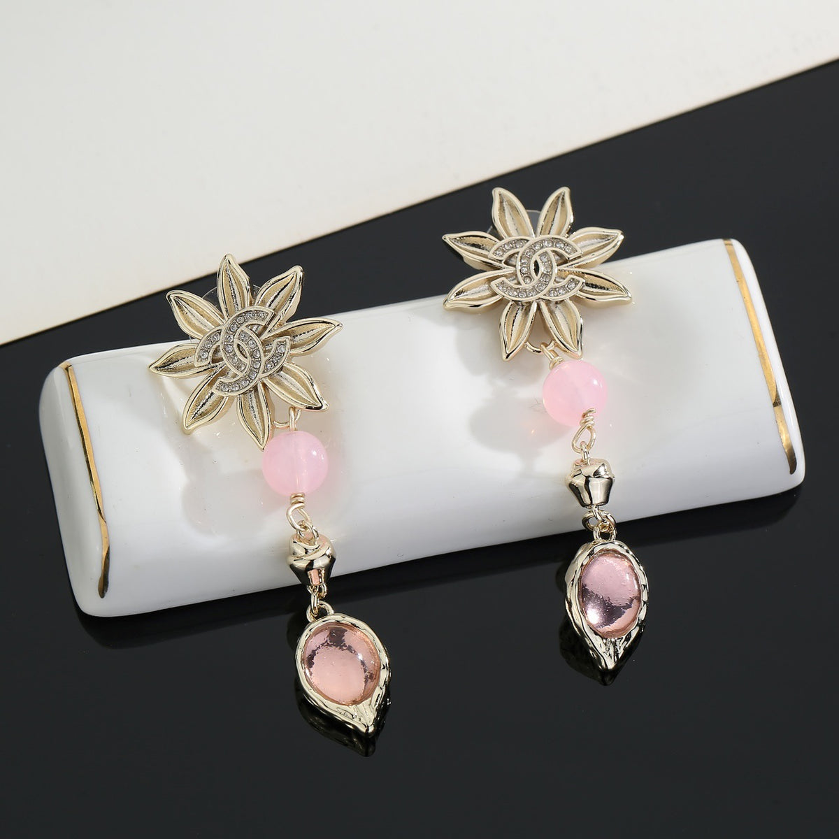 Double-C Emblem Stud Earrings in Gold-Tone – Design 019 close-up detail
