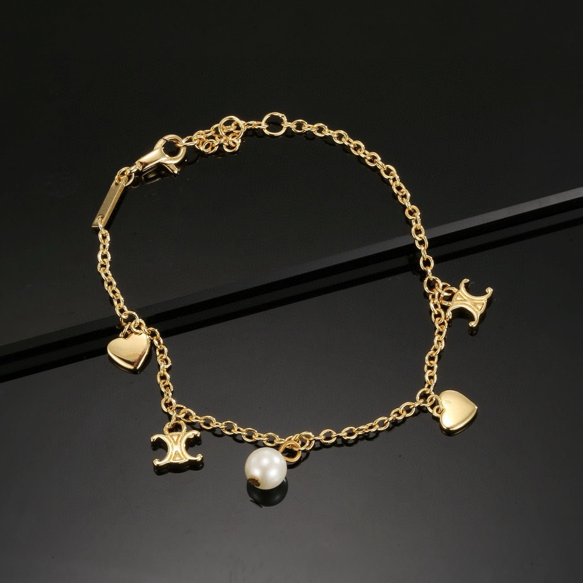Signature Emblem Bracelet in Polished Metal-Tone – Red Detail – Design 002 main product view