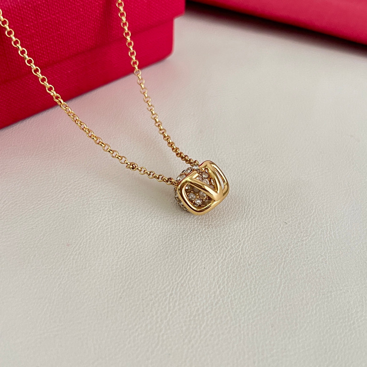 Signature Emblem Pendant Necklace in Polished Metal-Tone – Design 03 close-up view