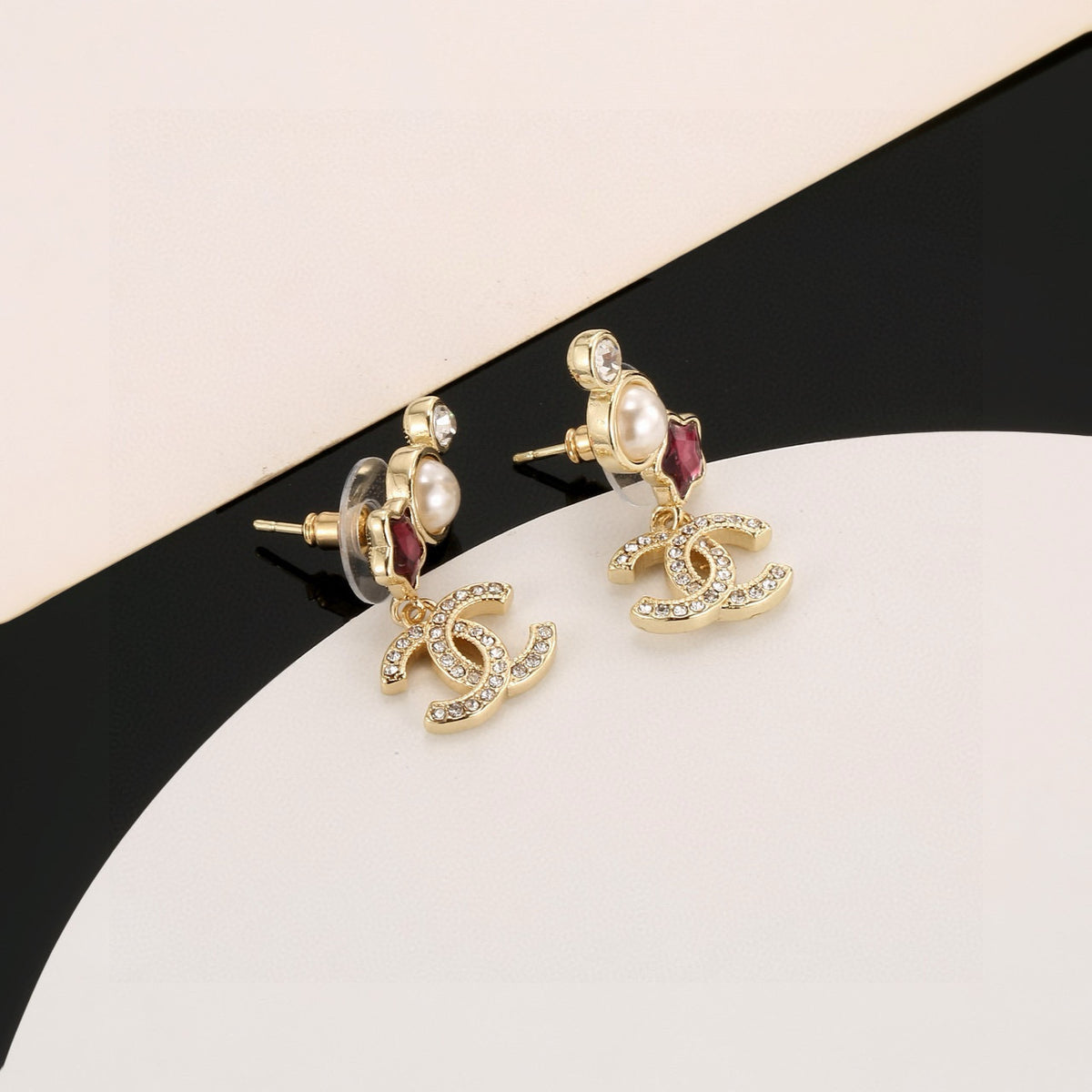 Double-C Emblem Stud Earrings in Gold-Tone – Star Detail – Design 006 front product view