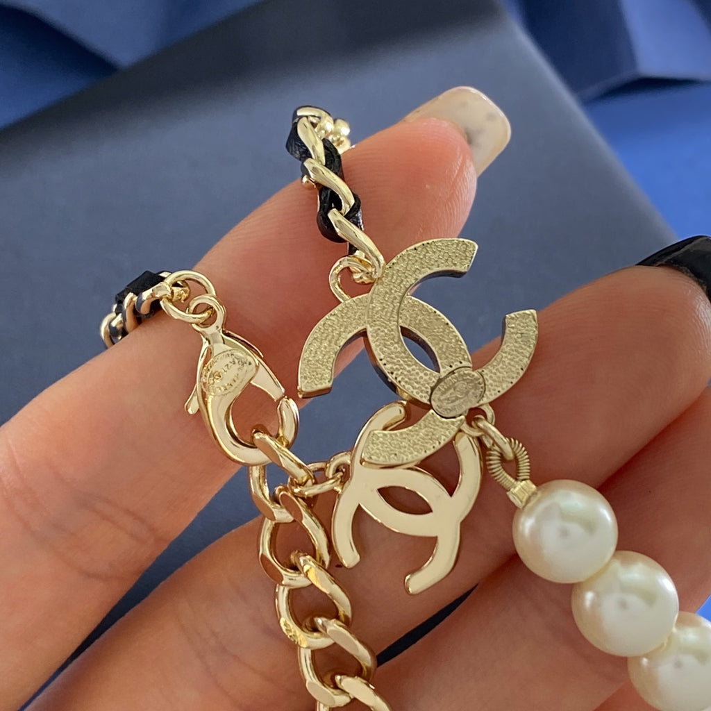 Double-C Emblem Pearl-Detail Pendant Necklace – Pearl Detail – Design 111 styled product view