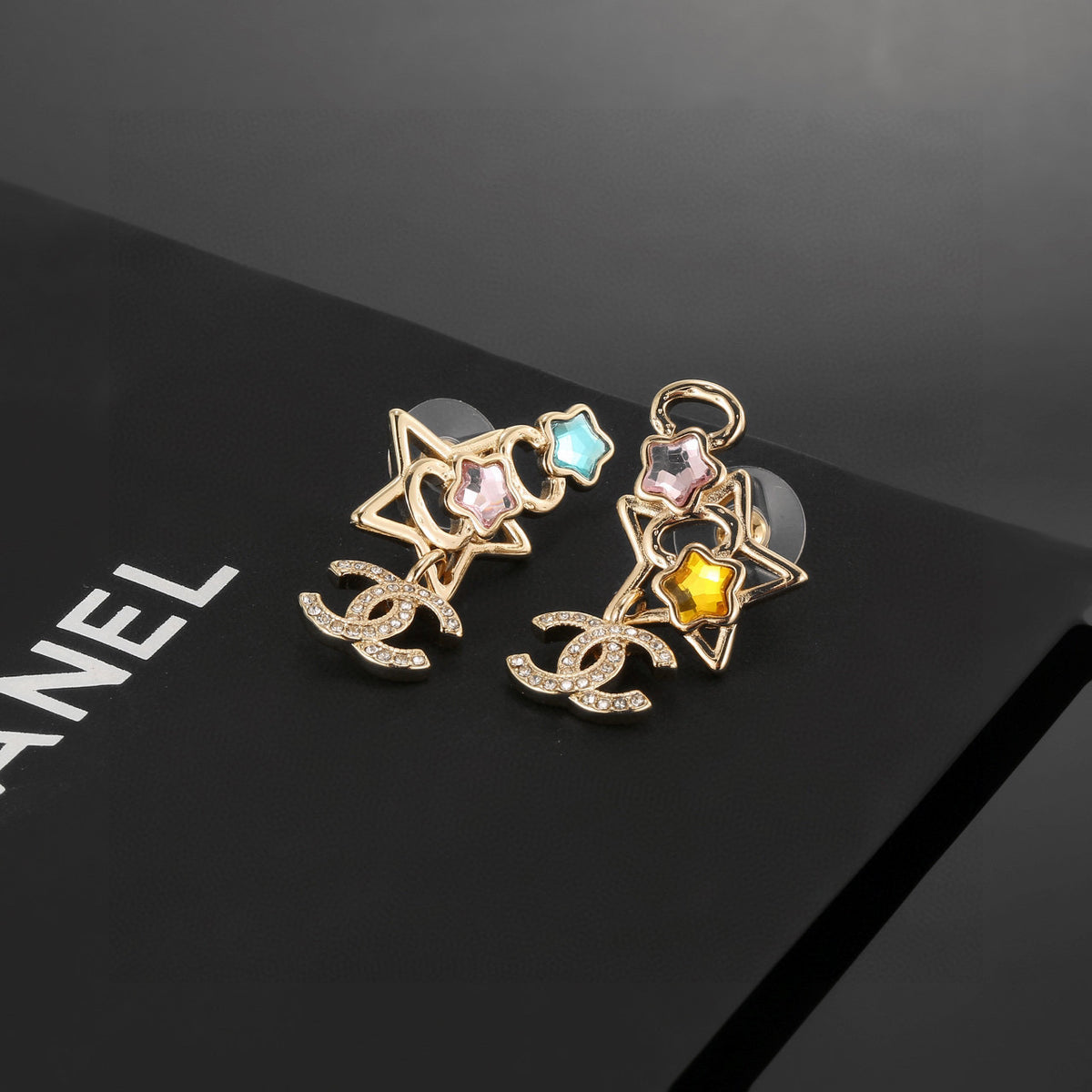 Double-C Emblem Stud Earrings in Gold-Tone – Star Detail – Design 005 styled product view