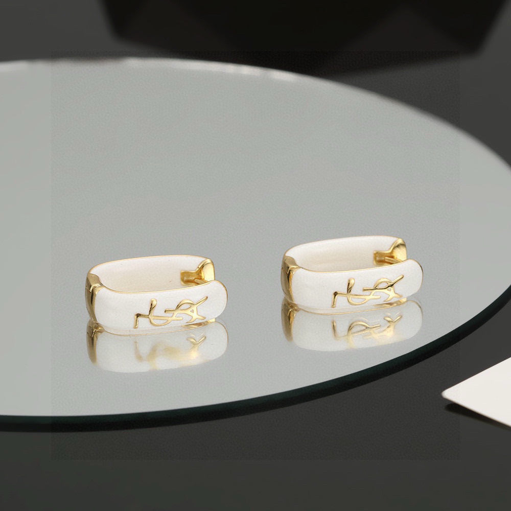 Geometric Emblem Stud Earrings in Gold-Tone – Design 007 styled product view
