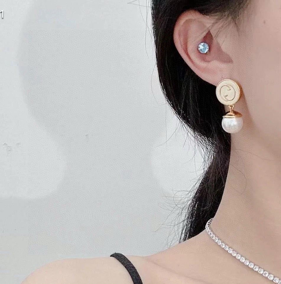 Geometric Emblem Stud Earrings in Polished Metal-Tone – Design 035 detail view