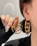 Letter Emblem Stud Earrings in Polished Metal-Tone – Design 022 main product view