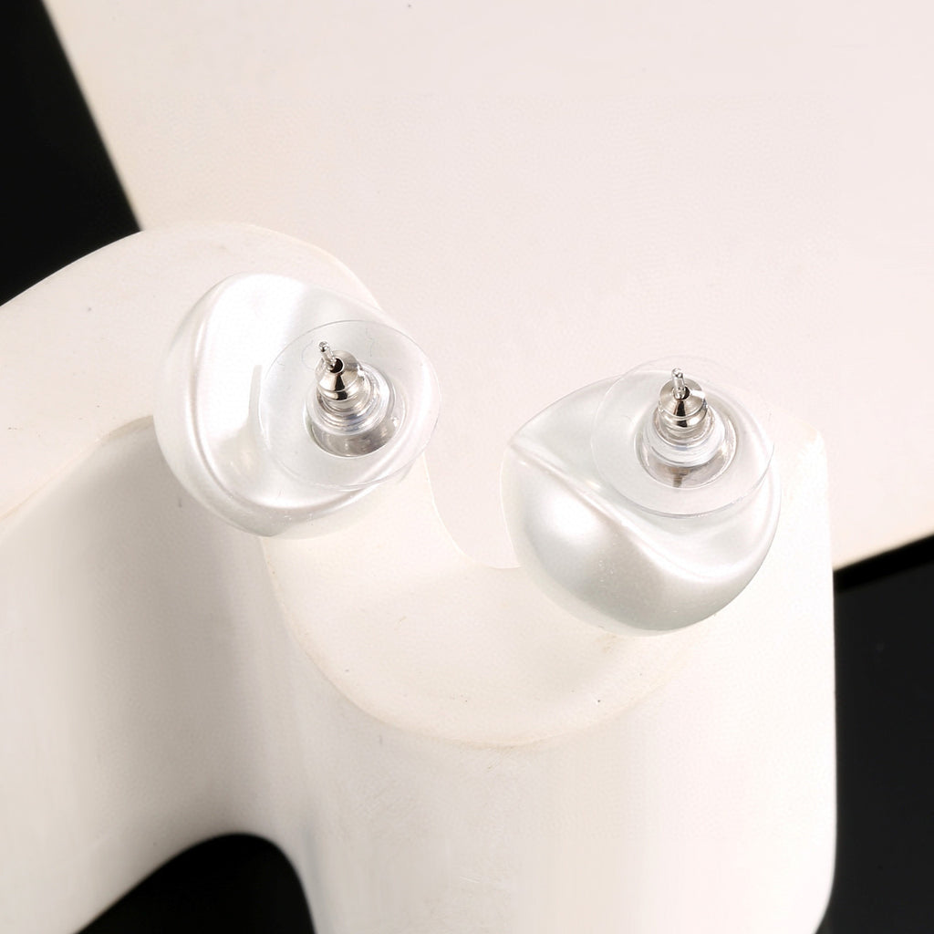 Double-C Emblem Stud Earrings in Polished Metal-Tone – White Detail – Design 003 main product view