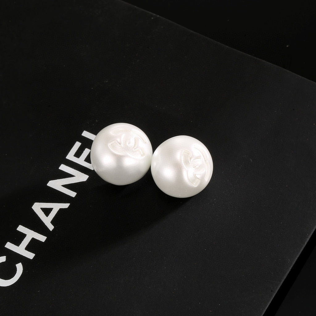 Double-C Emblem Stud Earrings in Polished Metal-Tone – White Detail – Design 003 front product view