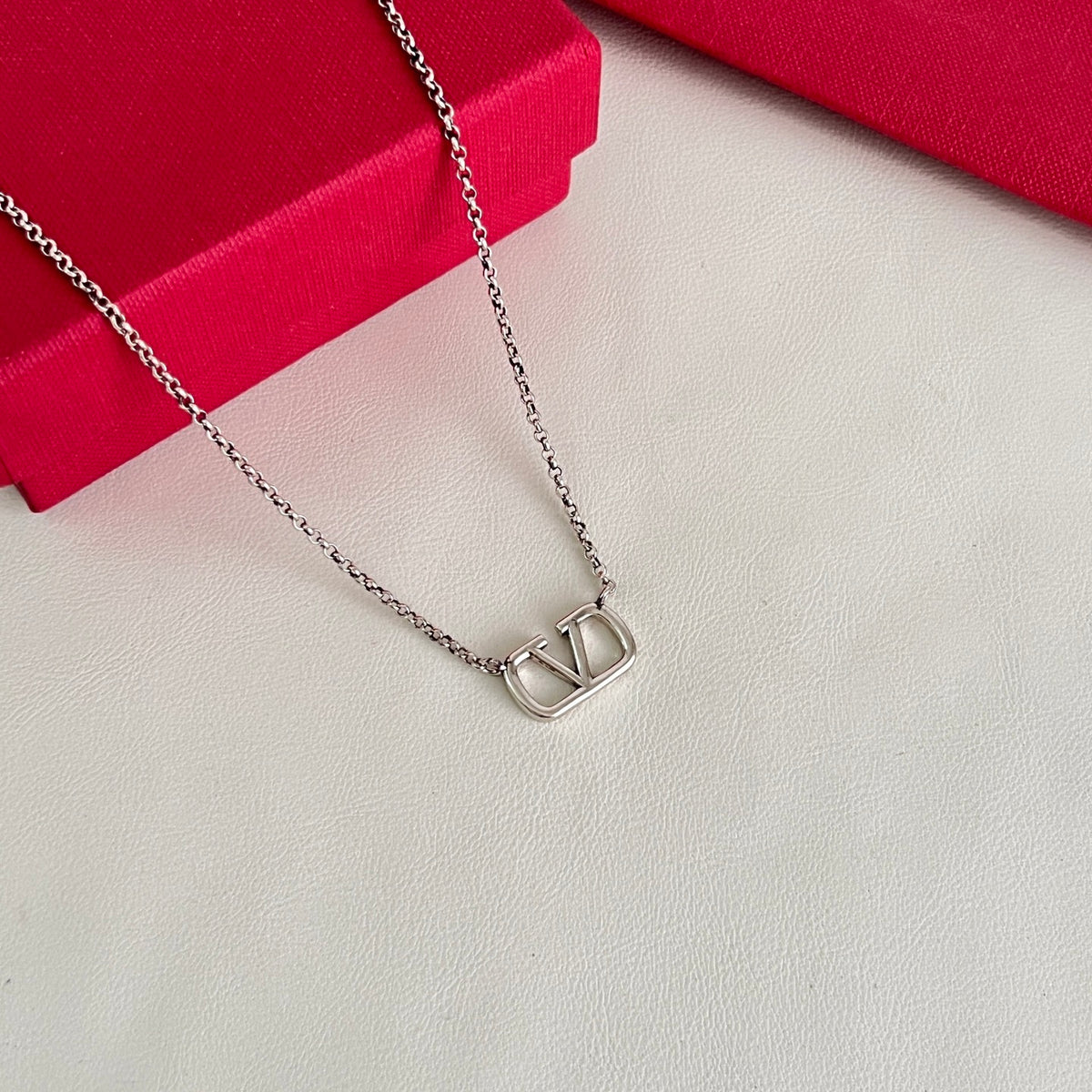 Signature Emblem Pendant Necklace in Polished Metal-Tone – Design 07 styled detail