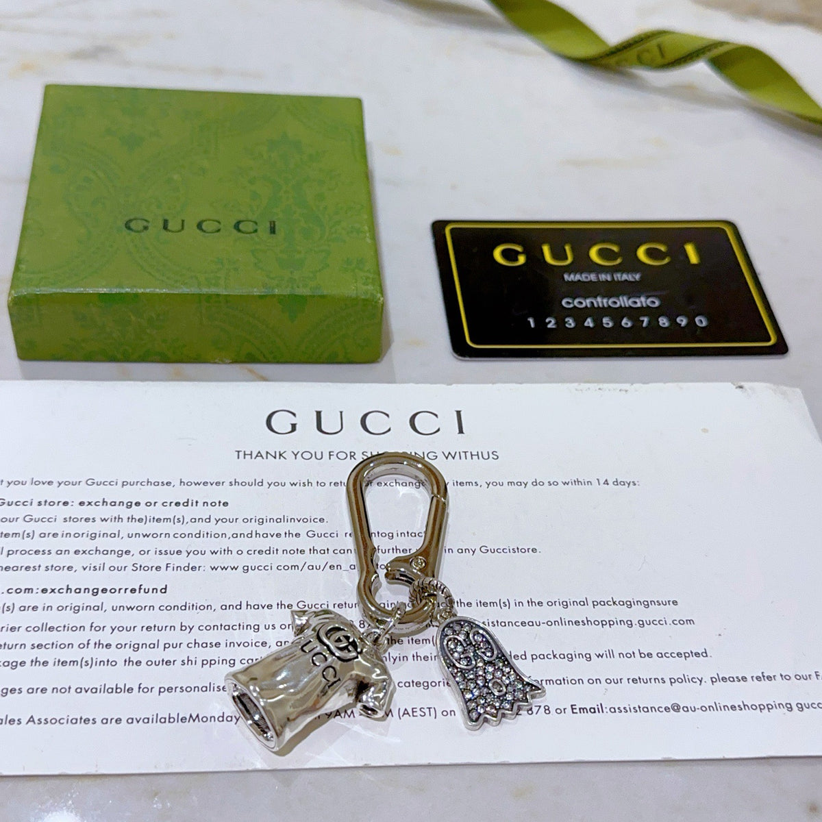 Double-G Emblem Keychain in Polished Metal-Tone – Design 028 detail view