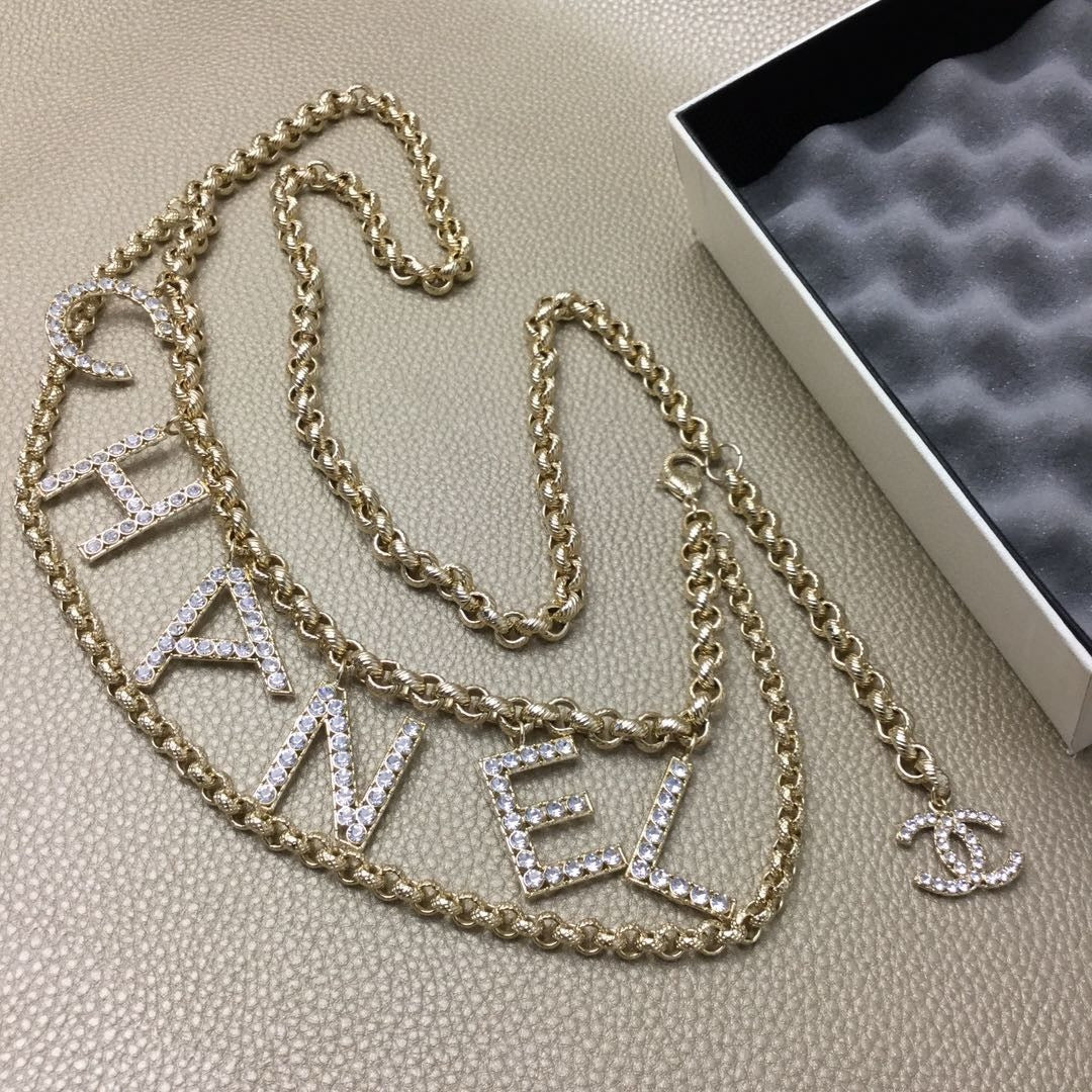 Signature Emblem Jewelry Accessory in Gold-Tone – White Detail – Design 004 detail view