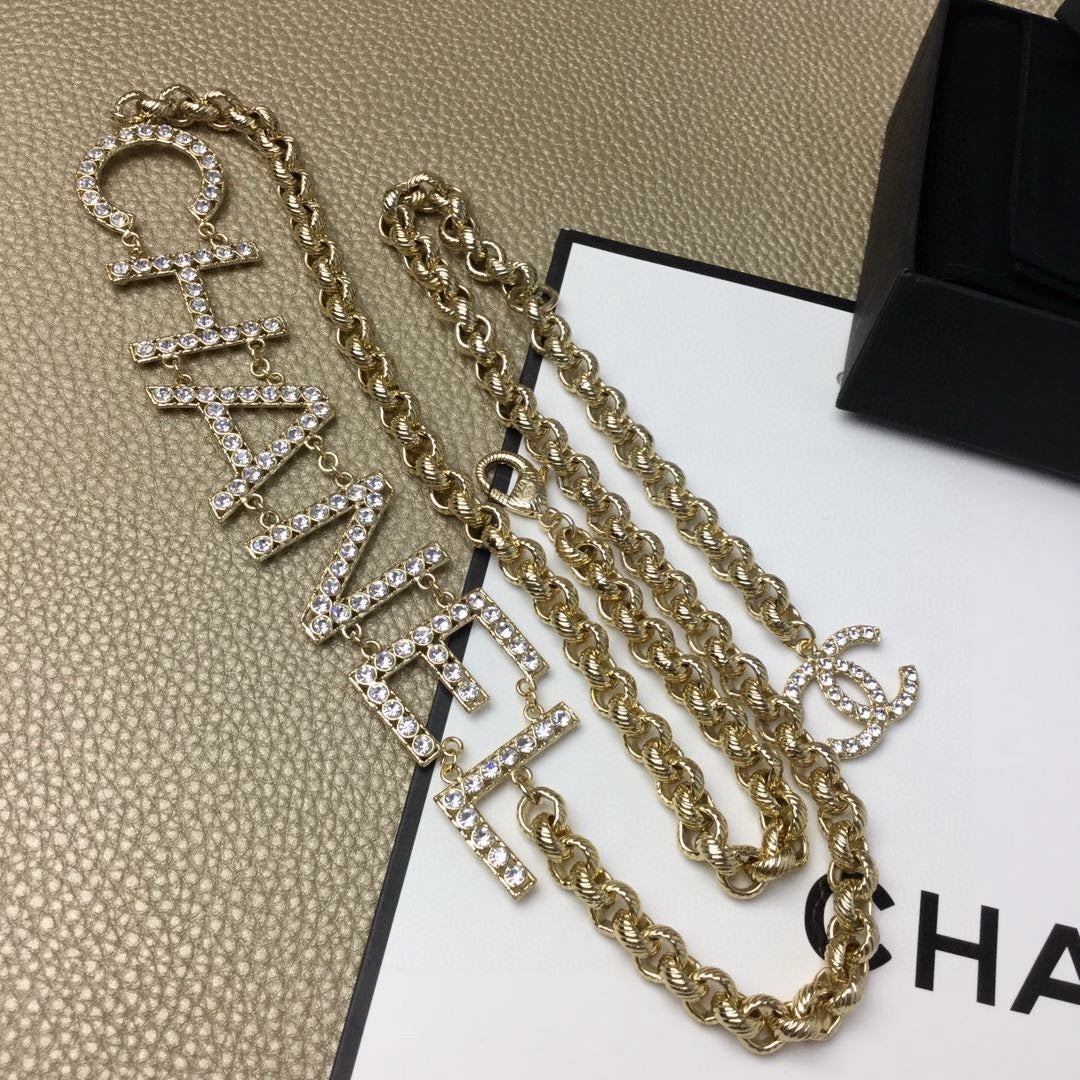 Signature Emblem Jewelry Accessory in Gold-Tone – White Detail – Design 003 side detail