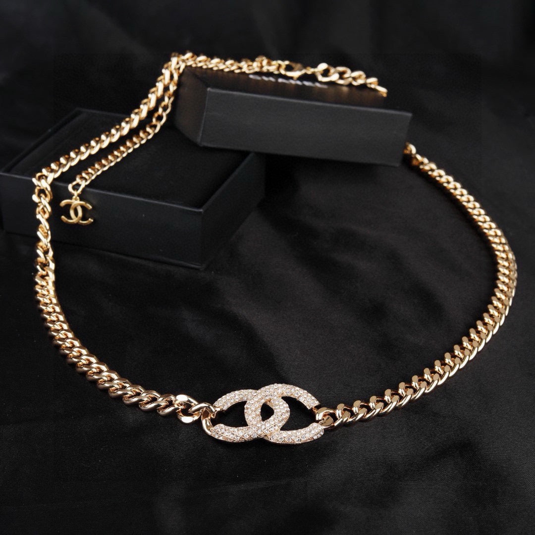 Signature Emblem Jewelry Accessory in Polished Metal-Tone – White Detail – Design 004 front product view