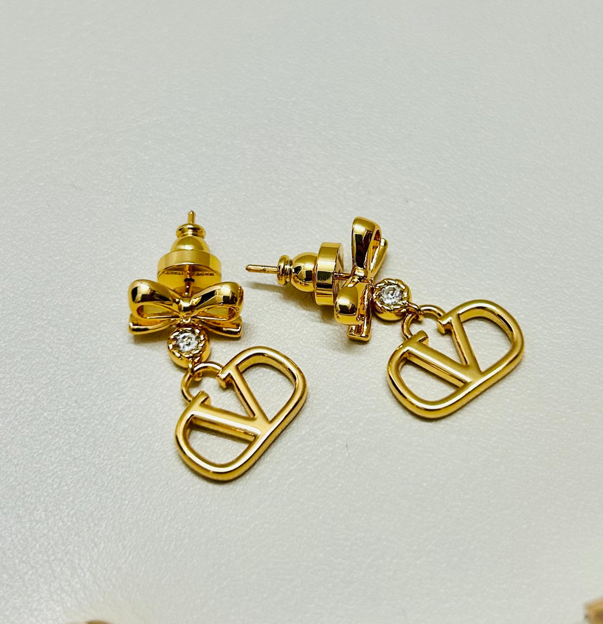 Signature Emblem Stud Earrings in Gold-Tone – Design 16 front view