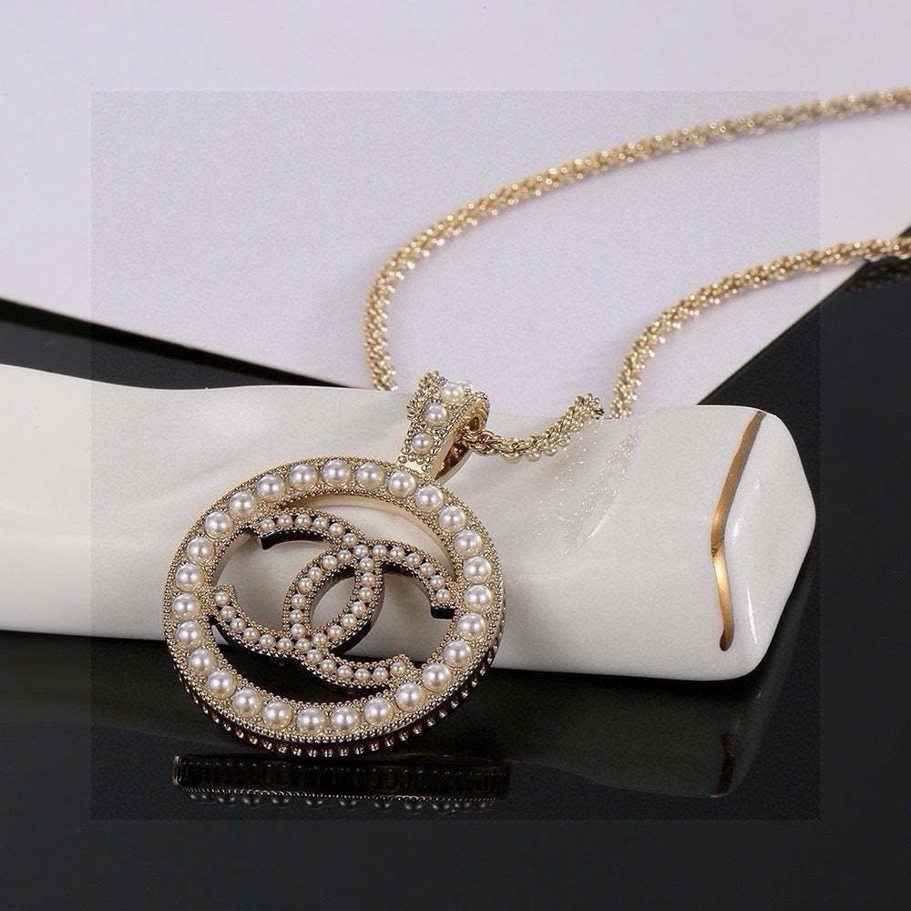 Double-C Emblem Pearl-Detail Pendant Necklace – Pearl Detail – Design 074 close-up detail