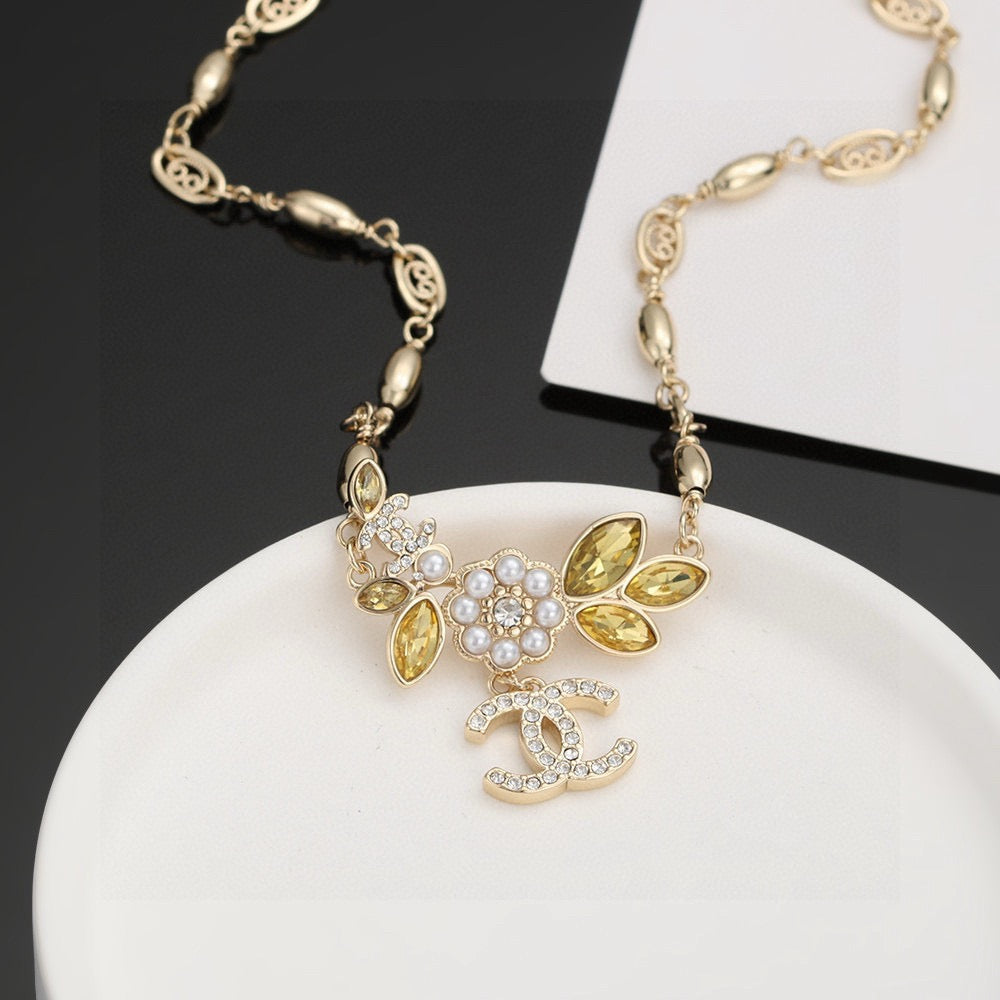Double-C Emblem Pearl-Detail Pendant Necklace – Pearl Detail – Design 073 front product view