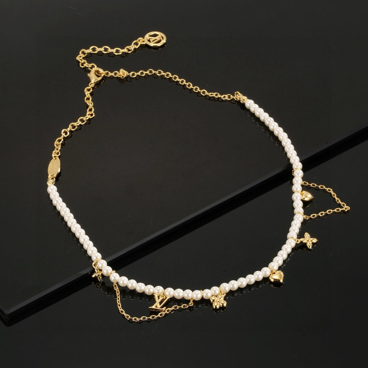 Letter Emblem Pendant Necklace in Polished Metal-Tone – Pearl Detail detail view
